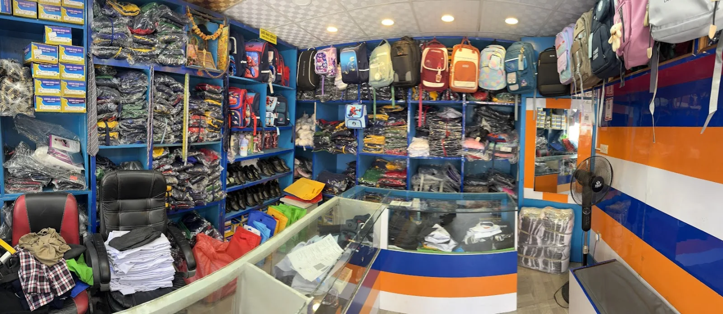 Uniforms, shoes and school bags displayed inside Pragati Venus Uniform